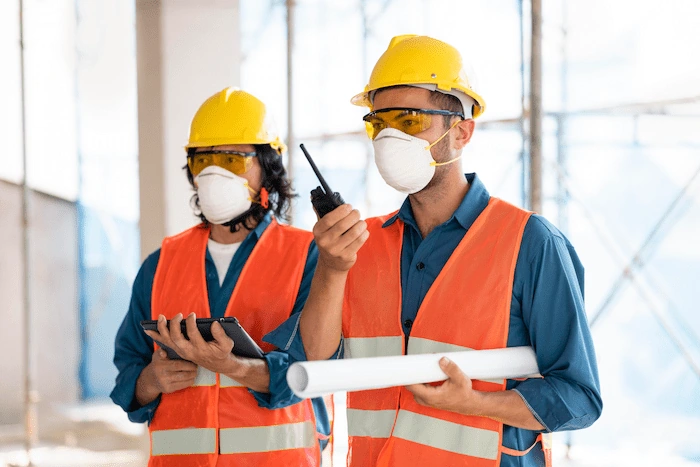 construction workers wearing ppe in construction site