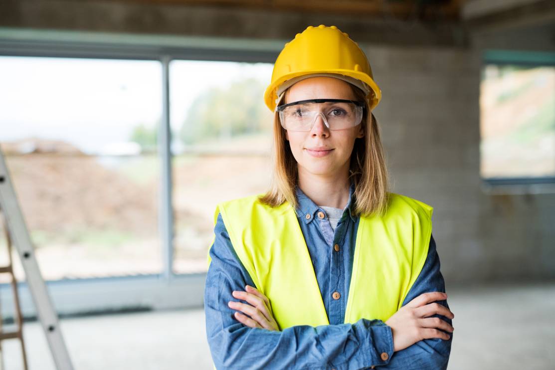 women using PPE in construction site