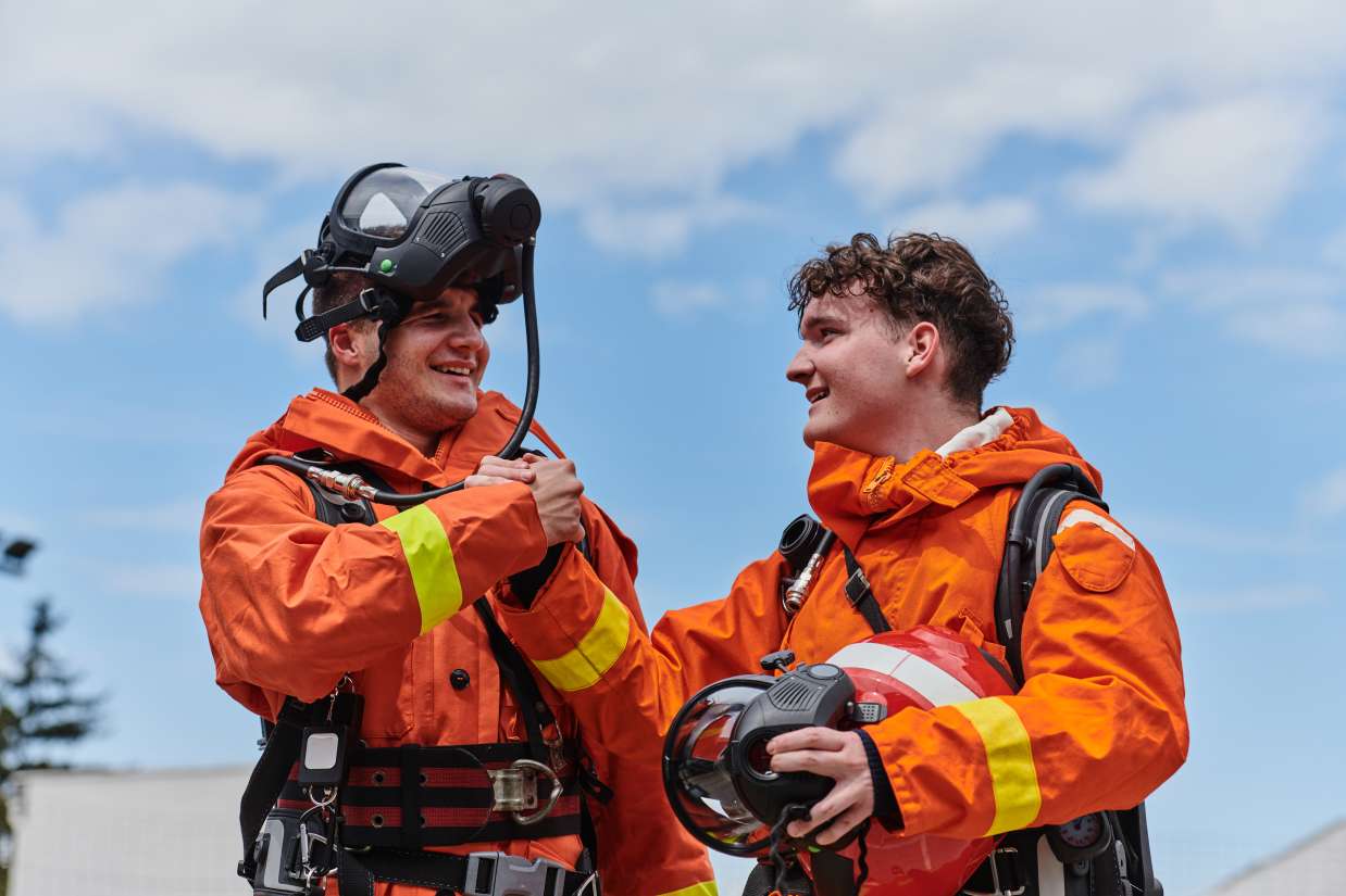 A team of firefighters, adorned in their uniforms