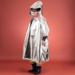 Aluminised poncho packed in action