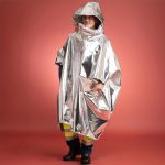 Aluminised poncho packed in action